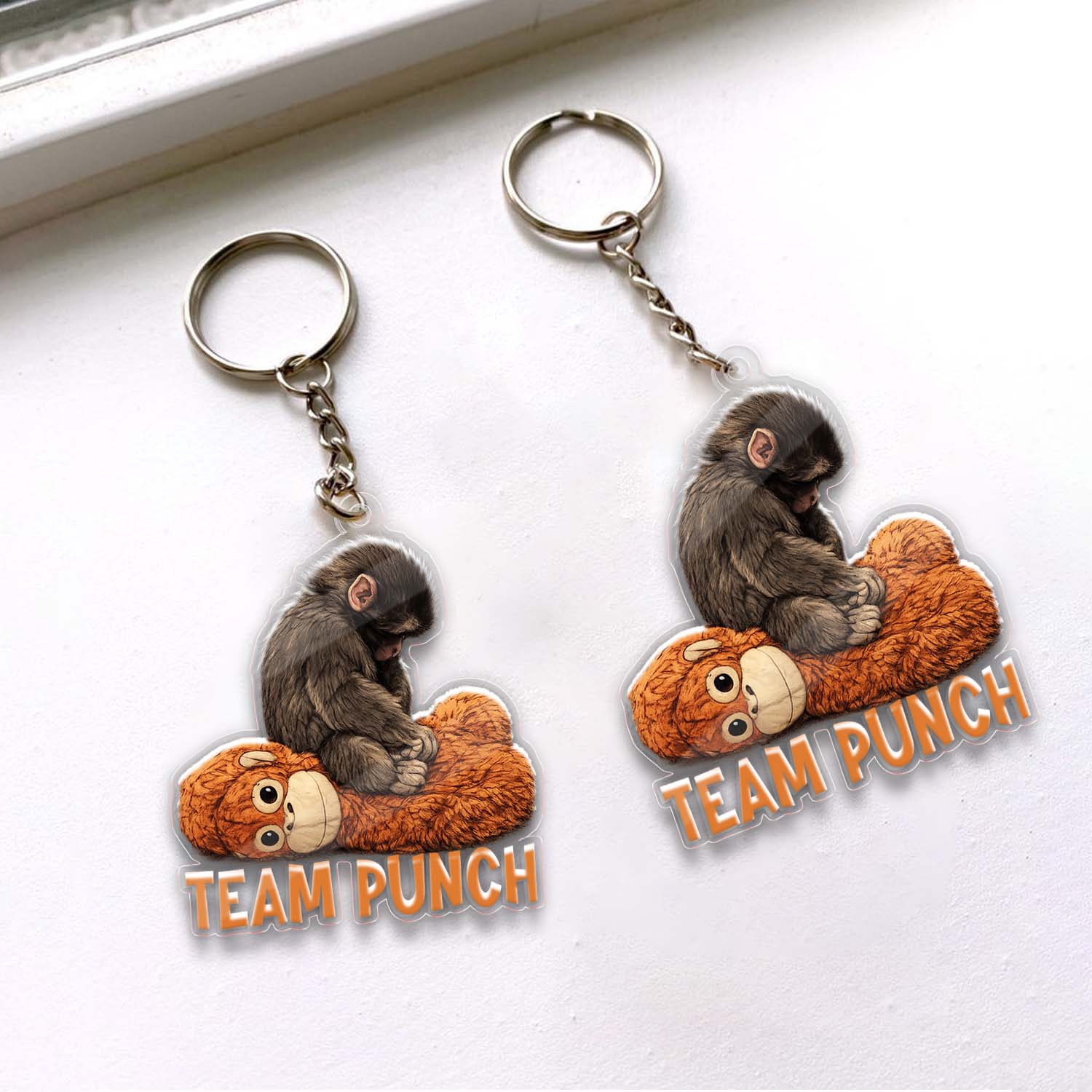 Team Punch Baby Monkey Acrylic Keychain
